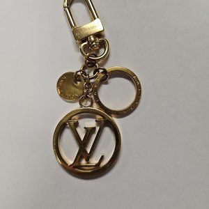 Louis Vuitton purse with key chain